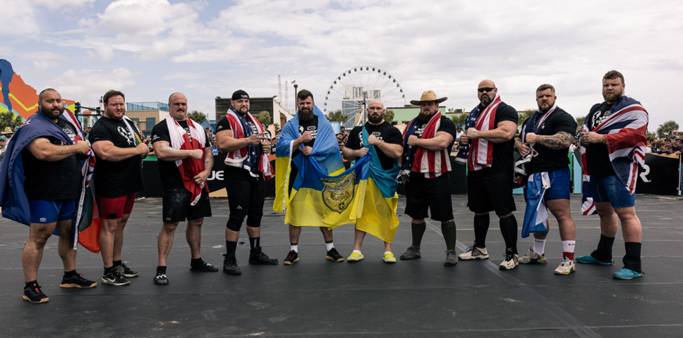 photo of WSM athletes with flags draped on them