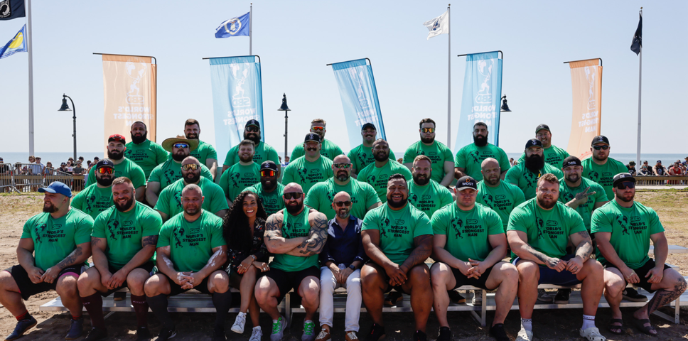 team photo of athletes wearing WSM green shirts