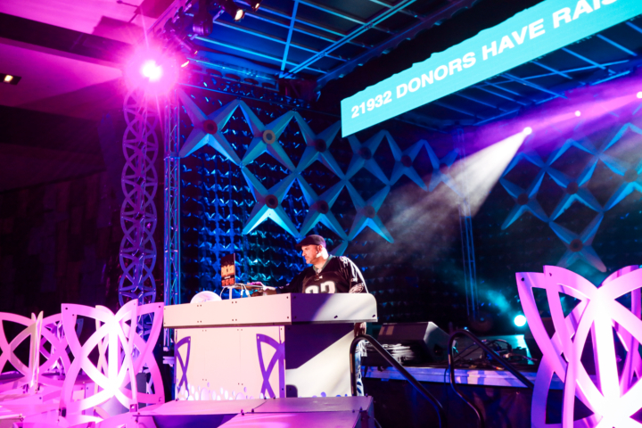 dj at custom turntable for fundraising event
