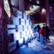 people walking past custom logo displays