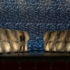 Rendering of a Wide audience-facing view of Shell modular scenic wall installed across a large stage.