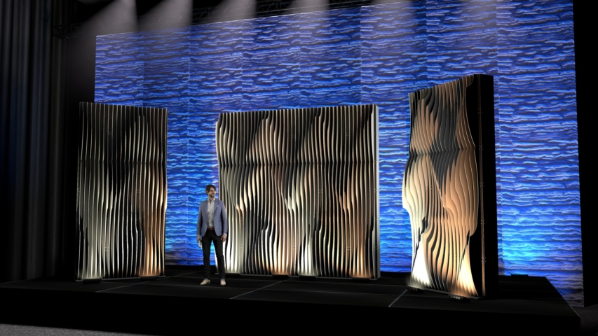 Rendering of a Shell modular scenic wall installed on a wide stage under warm lighting.