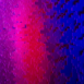 Close-up detail of Pixel modular scenic panel texture under pink and blue lighting.