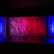 Pixel modular scenic wall installed on stage under red lighting.