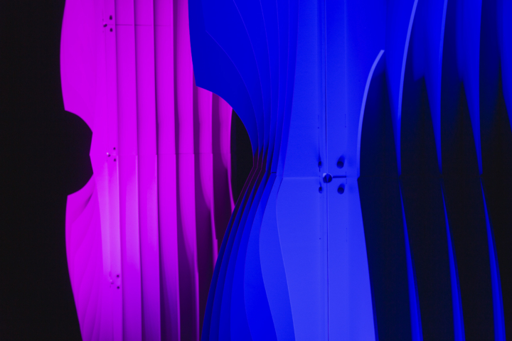 Close-up of Shell modular scenic panel surface under purple lighting.