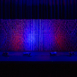 Pixel modular scenic wall installed on stage under low ambient lighting.