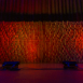 Pixel modular scenic wall on stage under low ambient lighting.