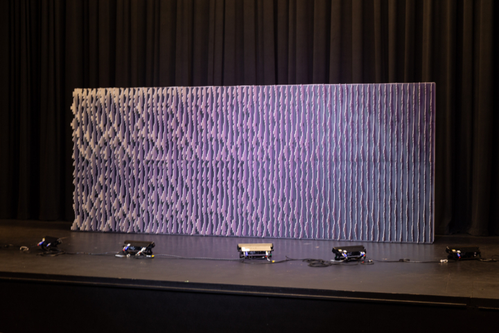 Front-facing Pixel modular scenic wall photographed in natural light.