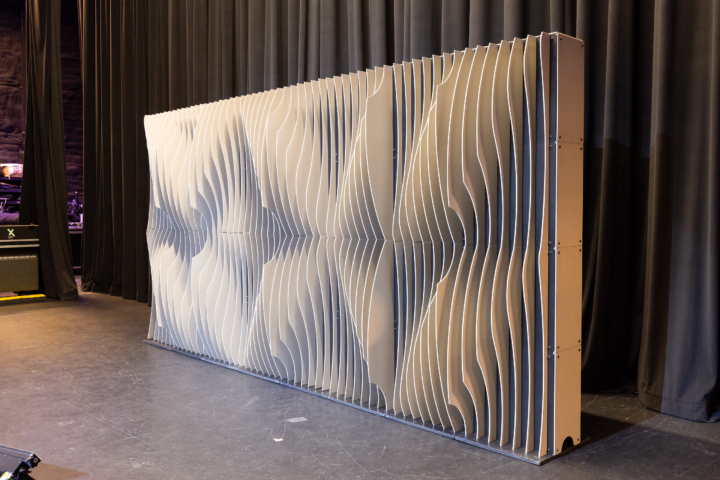 Angled view of Shell modular scenic wall photographed in natural light.