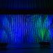 Shell modular scenic wall installed on stage under blue lighting.
