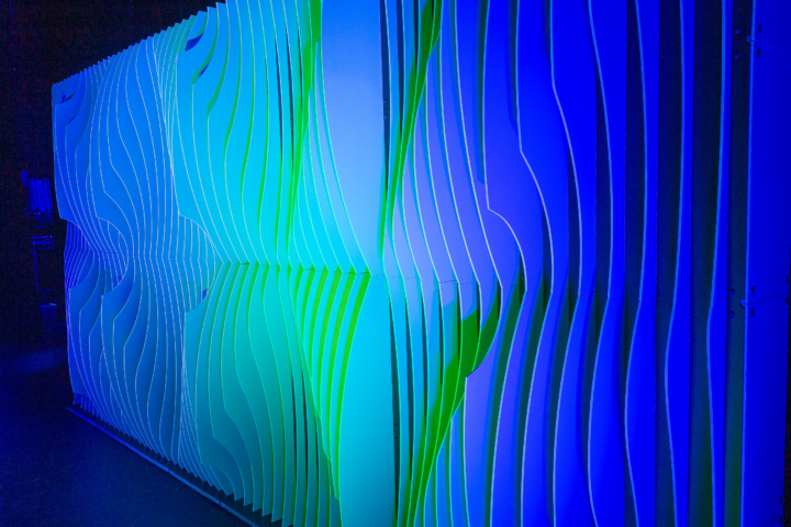 Close-up detail of Shell modular scenic panel surface under blue lighting.