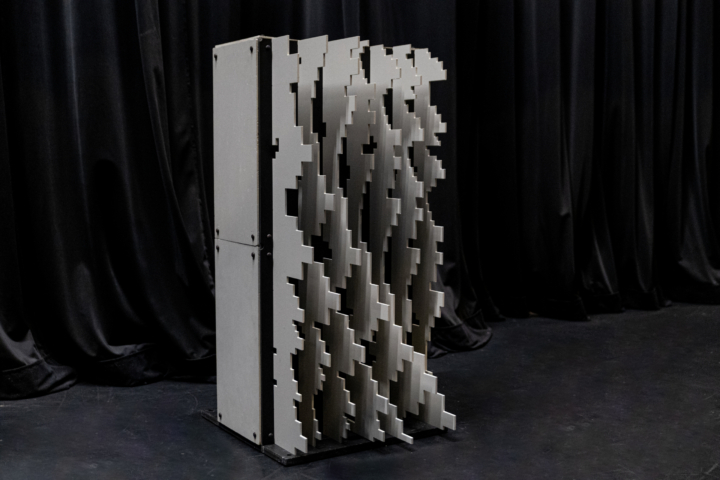 Angled studio view of Pixel modular scenic panel showing layered surface construction.