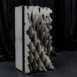 Angled studio view of Pixel modular scenic panel showing layered surface construction.
